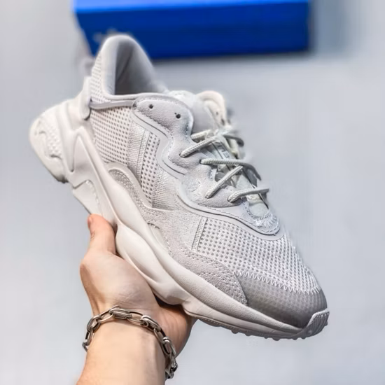 Designer Ozweego Luxury Casual Shoes Beige Running Shoes Men′ S and Women′ S Sports Shoes